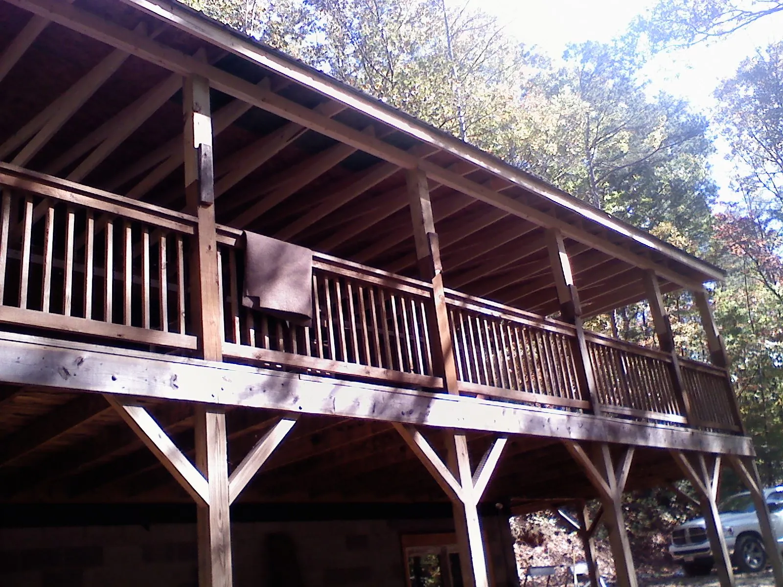 Timber framing under a new elevated porch and deck — Roof Leak Repair in Bingham Canyon by Roofing Brothers